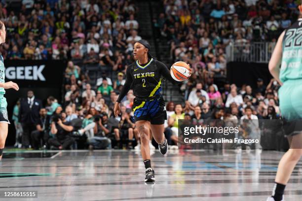 Odyssey Sims of the Dallas Wings handles the ball during the game against the New York Liberty on June 11, 2023 in Brooklyn, New York. NOTE TO USER:...