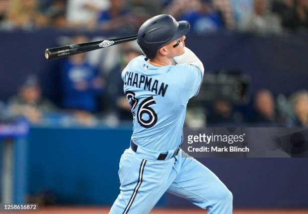 Matt Chapman of the Toronto Blue Jays hits a home run against the Minnesota Twins during the fifth inning in their MLB game at the Rogers Centre on...