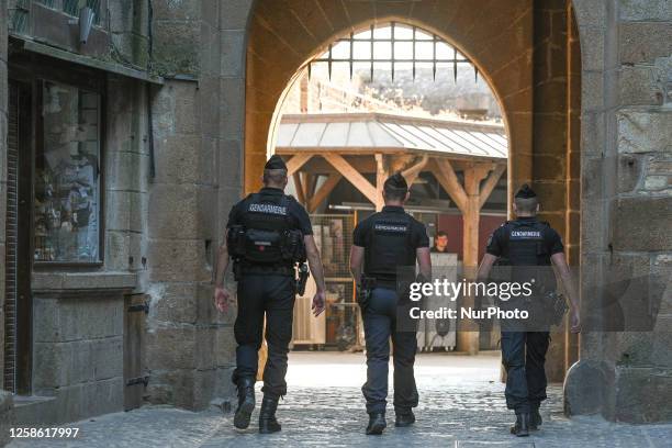 Members of the National Gendarmerie in Mont-Saint-Michel, France, on June 05, 2023. Nestled off the northwestern coast of Normandy, this enchanting...