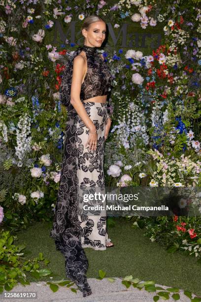 Leonie Hanne attends a Max Mara fashion show at Stockholm City Hall on June 11, 2023 in Stockholm, Sweden.