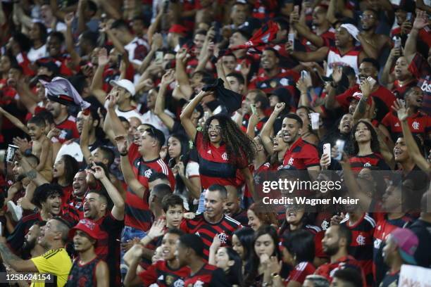 Flamengo fans celebrate after winning the match between Flamengo and Gremio as part of Brasileirao 2023 at Maracana Stadium on June 11, 2023 in Rio...