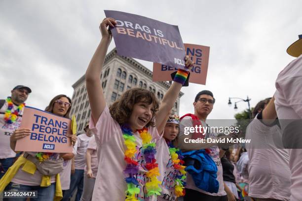 People march in support of transgender people and crossdressers during the annual LA Pride Parade on June 11, 2023 in the Hollywood section of Los...