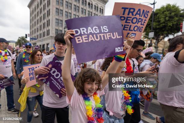 People march in support of transgender people and crossdressers during the annual LA Pride Parade on June 11, 2023 in the Hollywood section of Los...