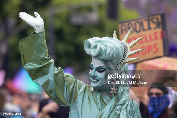People participate in the annual LA Pride Parade on June 11, 2023 in the Hollywood section of Los Angeles, California. The LA Pride Parade is one of...