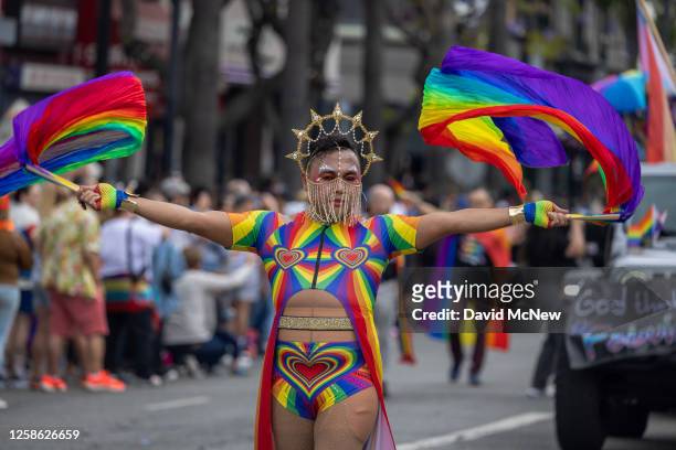 People participate in the annual LA Pride Parade on June 11, 2023 in the Hollywood section of Los Angeles, California. The LA Pride Parade is one of...