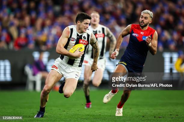 Jack Crisp of the Magpies in action during the 2023 AFL Round 13 match between the Melbourne Demons and the Collingwood Magpies at the Melbourne...