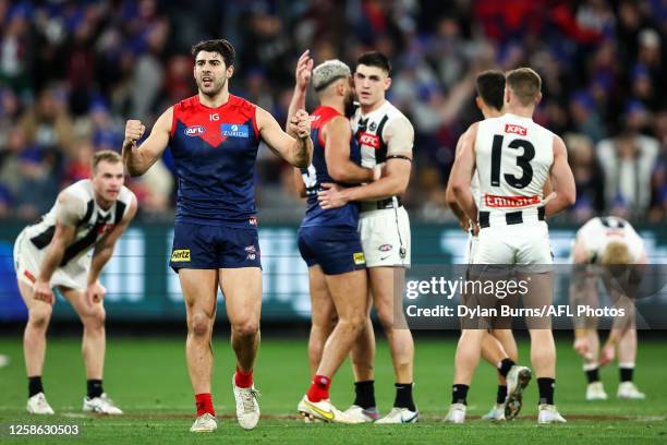 Christian Petracca of the Demons celebrates during the 2023 AFL Round 13 match between the Melbourne Demons and the Collingwood Magpies at the...