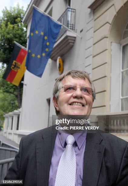 French retiree Daniel Rouxel, son of a French mother and a German Wehrmacht officer, smiles he got his German Certificate as he leaves the German...