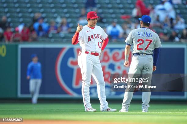 Los Angeles Angels Shohei Ohtani and Chicago Cubs Seiya Suzuki talking prior to game at Angels Stadium. Anaheim, CA 6/8/2023 CREDIT: Erick W. Rasco