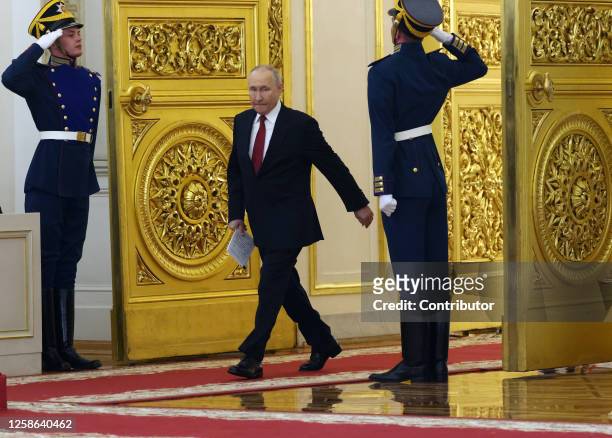 Russian President Vladimir Putin enters the hall of the Grand Kremlin Palace during an awards ceremony, on June 12, 2023 in Moscow, Russia. President...