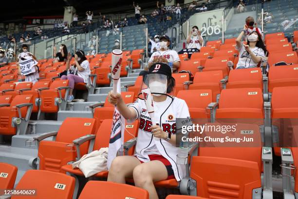 Fans enjoy during the KBO League game between LG Twins and Doosan Bears at the Jamsil Stadium on July 26, 2020 in Seoul, South Korea. South Korean...