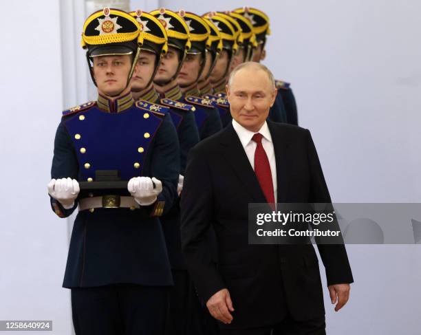 Russian President Vladimir Putin and Presidential Regiment's officers seen during an awards ceremony at the Grand Kremlin Palace on June 12, 2023 in...