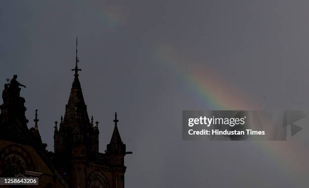 Rainbow sprawls across the sky, after sudden shower of rain at Chhatrapati Shivaji Maharaj Terminus, on June 11, 2023 in Mumbai, India.