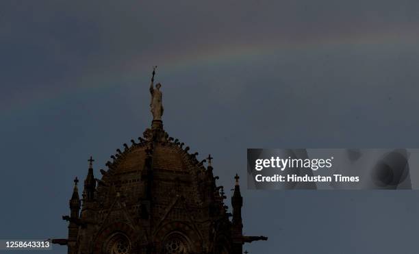 Rainbow sprawls across the sky, after sudden shower of rain at Chhatrapati Shivaji Maharaj Terminus, on June 11, 2023 in Mumbai, India.