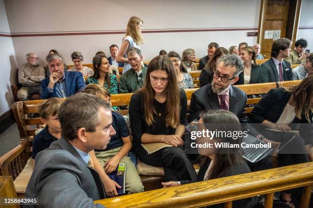 Lead claimant Rikki Held confers with members of Our Children's Trust legal team before the start of the nation's first youth climate change trial at...