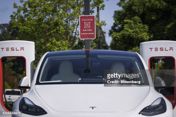 Tesla Model 3 charges at a Tesla Supercharger location in Scotts Valley, California, US, on Thursday, June 1, 2023. Tesla is making its ubiquitous...