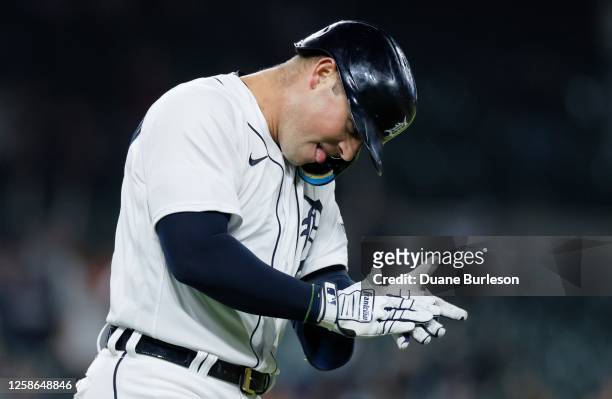 Spencer Torkelson of the Detroit Tigers celebrates knocking in Andy Ibanez for a 6-5 over the Atlanta Braves in the 10th inning at Comerica Park on...