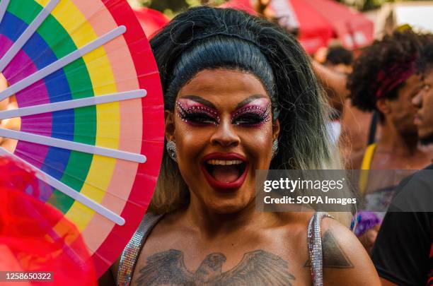 Drag queen seen smiles during the LGBTQIA+ Parade. In celebration of LGBTQIA+ pride month, the LGBTQIA+ community held a procession in Paulista...