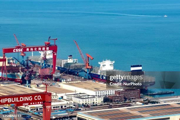 Aerial photo shows the Haixiwan Marine Industry Base of the West Coast New Area in Qingdao, East China's Shandong Province, Feb 2, 2023. In recent...