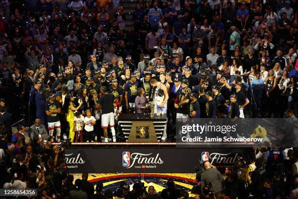 Nikola Jokic of the Denver Nuggets is presented with the Bill Russell Finals MVP Trophy after game 5 of the 2023 NBA Finals on June 12, 2023 at the...