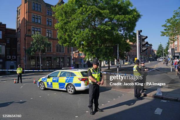 Police officers at the Maid Marian Way junction of Upper Parliament Street in Nottingham, as police have put in place multiple road closures in...