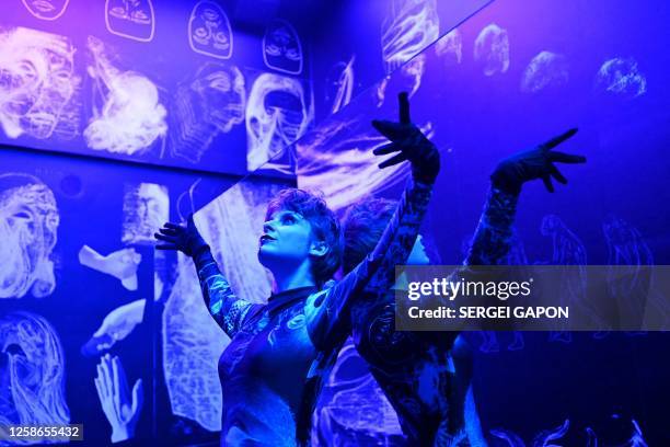 An artist performs at the Alchemist restaurant in Copenhagen, Denmark, on May 25, 2023. With off-the-wall dishes like butterfly wings or simple local...