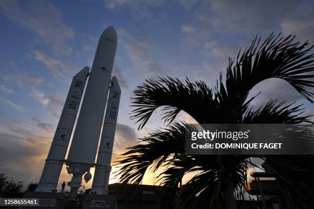 Photo taken on July 22, 2008 shows a model of Ariane 5 rocket at the entrance of the Spaceport of Kourou. AFP PHOTO / DOMINIQUE FAGET