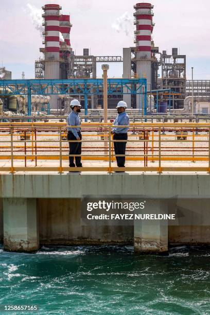 In this picture taken on March 30 Mohamed Ali al-Qahtani , Phase General Manager at the Ras al-Khair water desalination plant, owned by the Saudi...