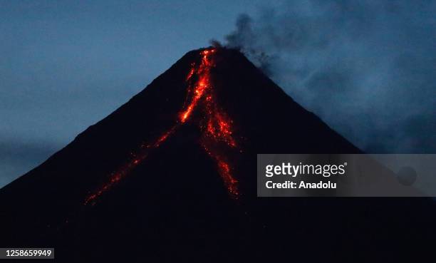 Mount Mayon, the Philippinesâ most active volcano, spews lava after an eruption in Albay, Philippines on June 13, 2023. More than 13,000 families...