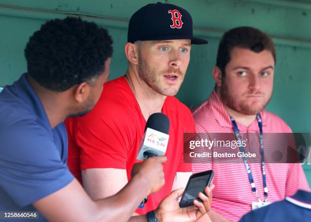 Boston Red Sox IF Trevor Story speaks to the media in the dugout before the game. The Red Sox lost to the Colorado Rockies, 4-3, in 10 innings.