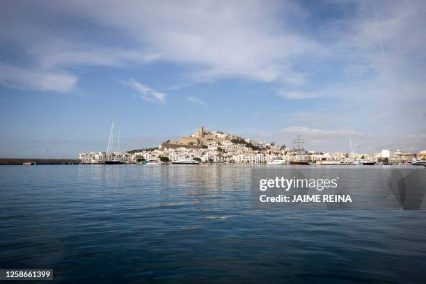 Picture shows a general view of Ibiza Town with the 12th-century Cathedral of Santa Maria de la Neu topping Dalt Vila, the fortified old town of...