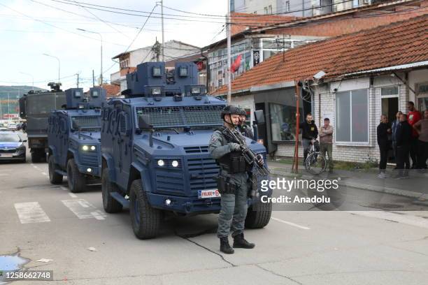 Armored police vehicles are seen retreating towards the Bosnian Neighborhood after situation was brought under control by the security forces after a...