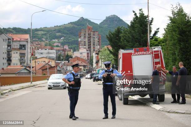 Police officers take security measures as armored police vehicles retreating towards the Bosnian Neighborhood after situation was brought under...