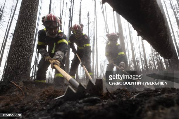 French firefighters battle fires north from the city of Chibugamau, Quebec, in Canada on June 12, 2023. Quebec has deployed hundreds of firefighters,...