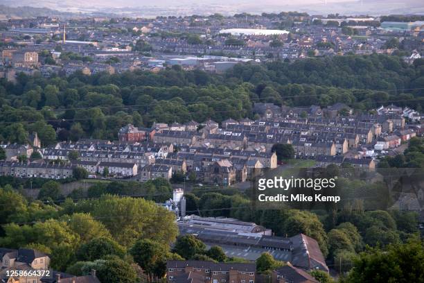 Old mill workers cottages within the terraced streets just outside the town centre on 4th June 2023 in Halifax, United Kingdom. Halifax is a town in...