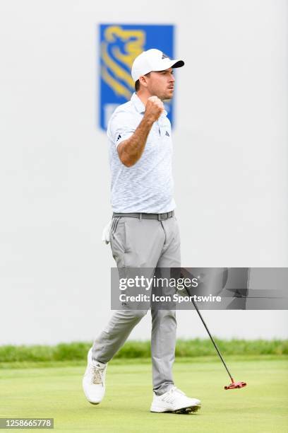 Nick Taylor of Canada celebrates after sinking his putt on the 18th hole during the final round of the RBC Canadian Open at Oakdale Golf & Country...