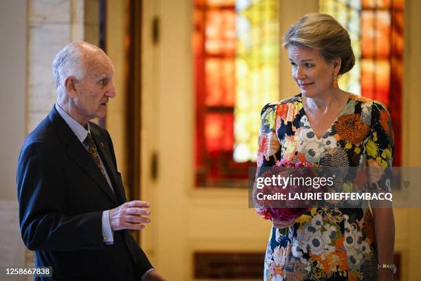 Competition chairman Baron Jan Huyghebaert speaks with Queen Mathilde of Belgium as she arrives to the closing concert of the Queen Elisabeth...