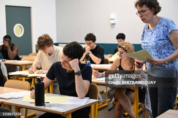 Pupils start the philosophy test as part of the baccalaureat exams, at the Academie de Paris, in Paris, on June 14, 2023.