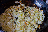 Sauteed onions in pan Close-up.