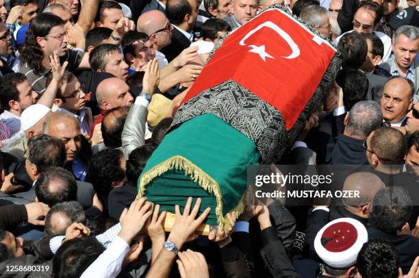 Relatives carry the coffin of Prince Osman Ertugrul on September 26, 2009 after his funeral ceremony at the Blue Mosque Istanbul. Prince Osman...