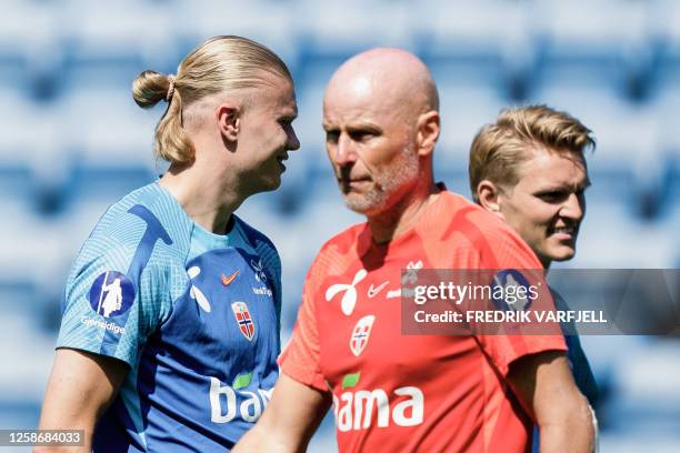 Norway's coach Staale Solbakken oversees a training session with Norway's men's national football team with Norway's forward Erling Braut Haland and...