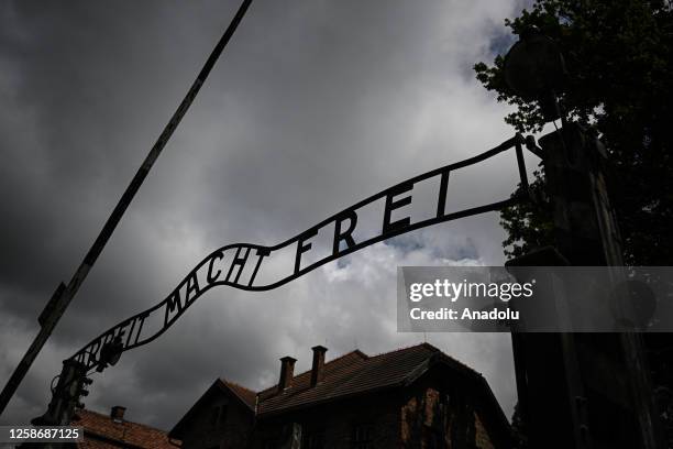View of the iconic entrance gate ofthe Auschwitz concentration camp that reads 'Arbeit Macht Frei' during 83rd anniversary of the first transport of...