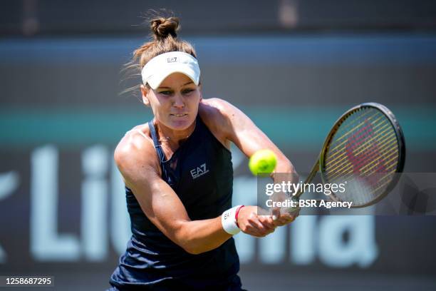 Veronika Kudermetova of Russia plays a backhand in her Women's Singles Second Round match against Carol Zhao of Canada on Day 3 of the Libema Open...