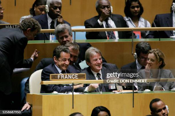 President of France Nicolas Sarkozy and French Foreign Minister Bernard Kouchner laugh before the start of the 62nd session of the UN General...