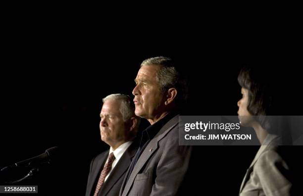 President George W. Bush makes a statement to the press with US Secretary of Defense Robert Gates and US Secretary of State Condoleezza Rice after...