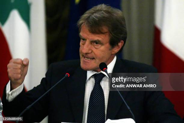 France's new Foreign Minister Bernard Kouchner gestures during a press conference after meeting Lebanese Prime Minister Fuad Siniora at the Lebanese...