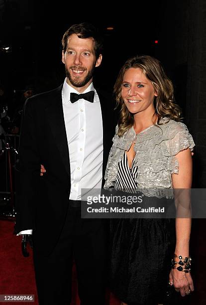 Author Aron Ralston and Jessica Trusty arrive at the premiere of "127 Hours" at the Academy Of Motion Picture Arts and Sciences Samuel Goldwyn...
