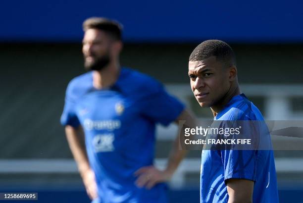 France's forward Kylian Mbappe attends a training session in Clairefontaine-en-Yvelines on June 14 as part of the French national team's preparations...