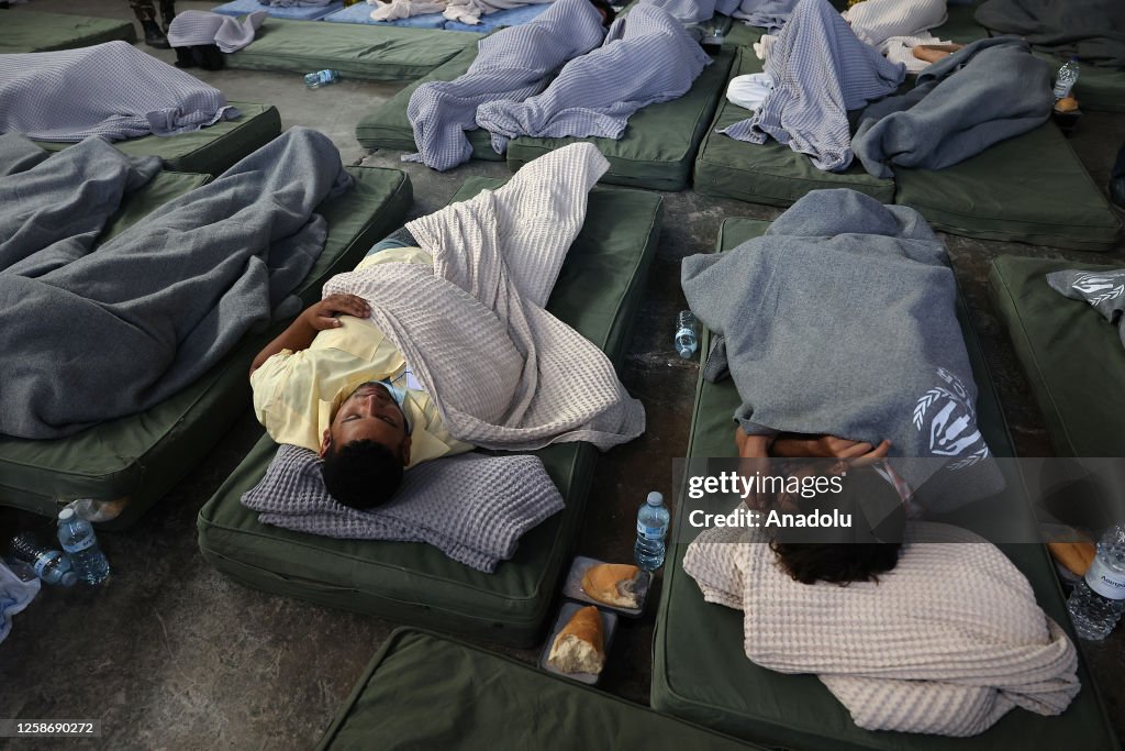 Rescued migrants in Greece's Kalamata