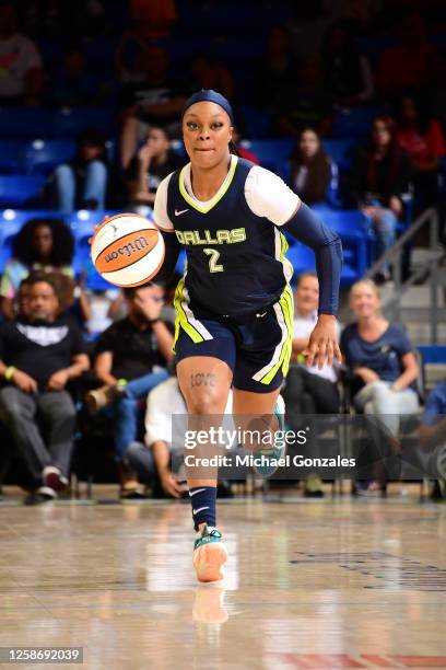 Odyssey Sims of the Dallas Wings dribbles the ball during the game against the Los Angeles Sparks on June 14, 2023 at the College Park Center in...